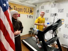 Sister Stephanie Baliga of the Franciscans of the Eucharist of Chicago runs a marathon on a treadmill in 2020.